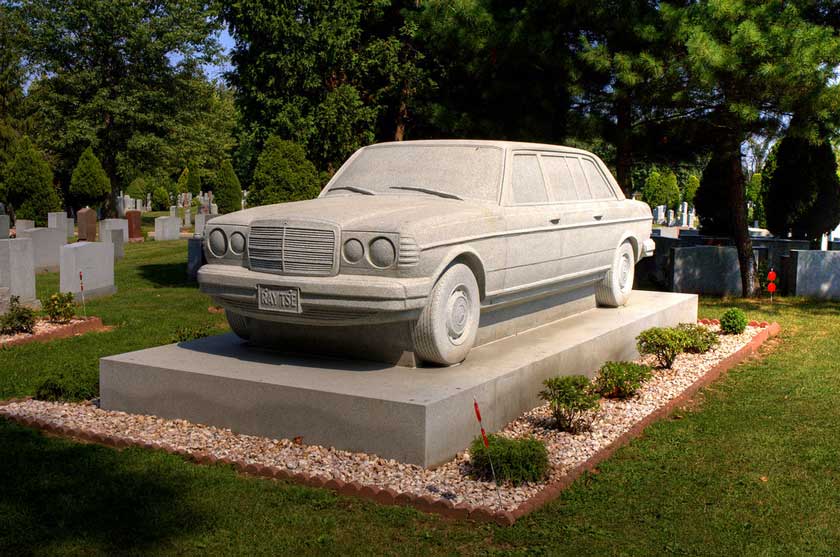 a 36-ton granite replica of an 82 Mercedes-Benz 240D limousine tombstone at Rosedale Cemetery in Northern New Jersey.